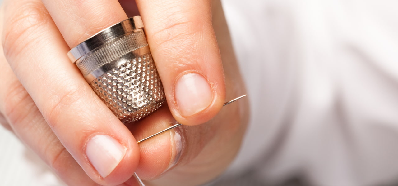 Dés à coudre & protège-doigts